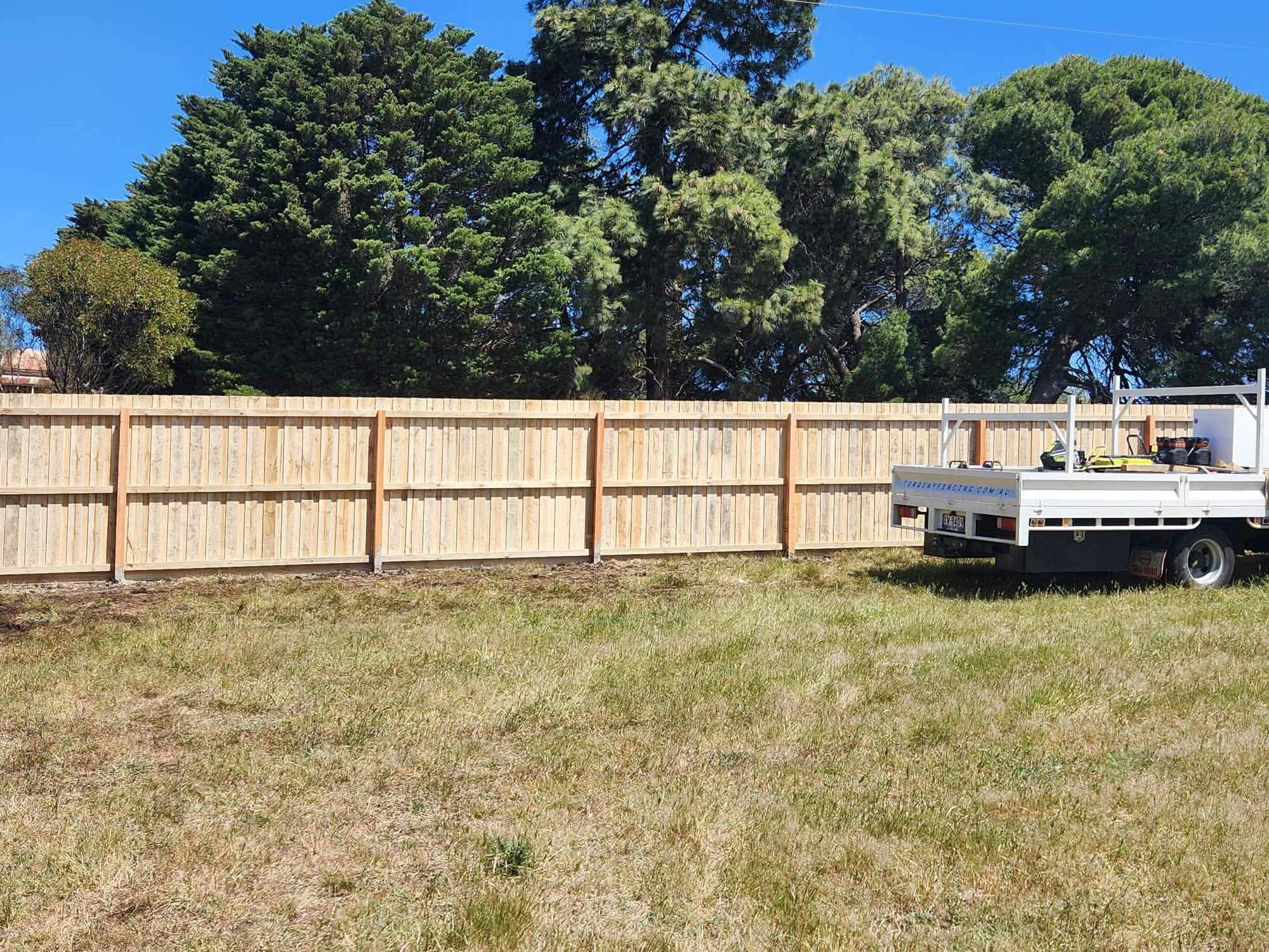 Long timber boundary fence installed by Torquay Fencing